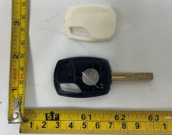 Accessible button-cell battery in recalled Giant LED-light key
